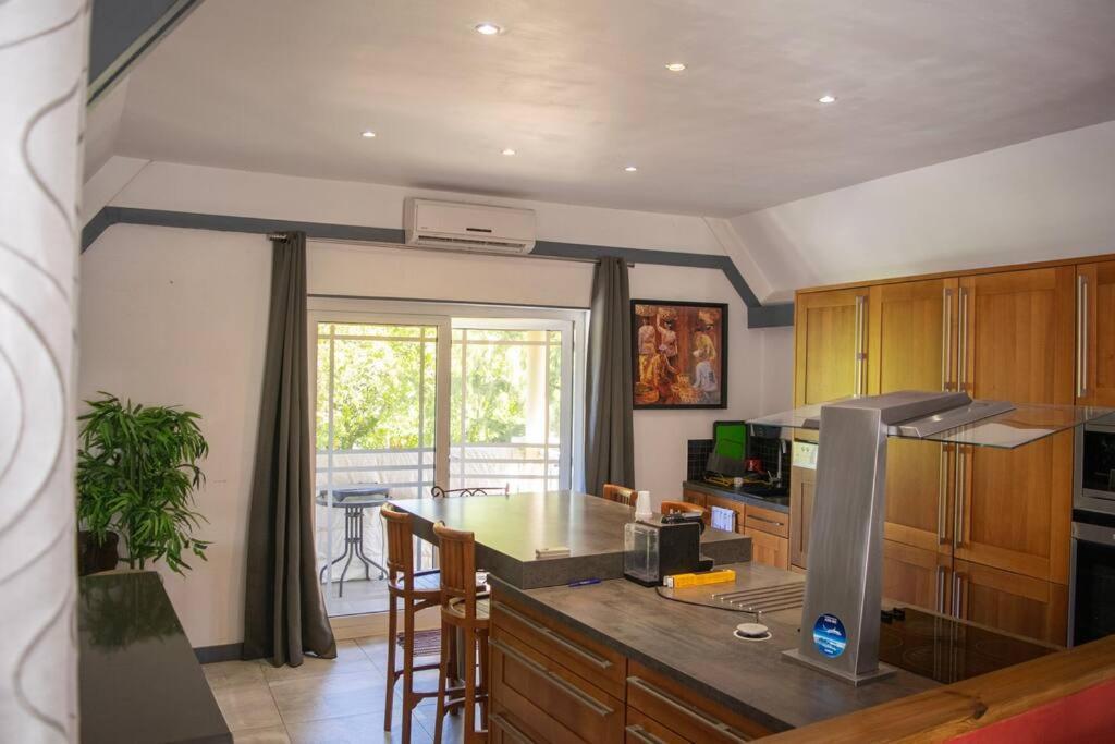 Appartement Le Flamboyant à Saint-Gilles Les Bains Extérieur photo